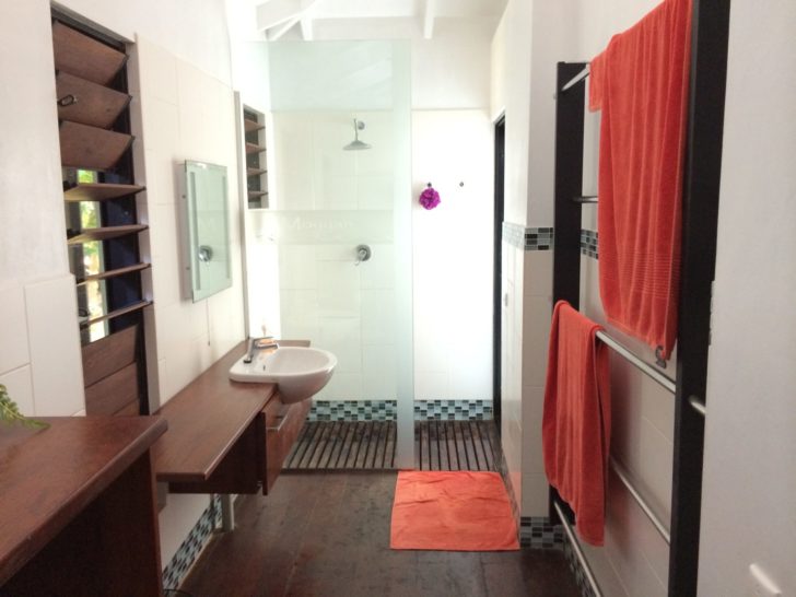 a bathroom with a sink and towel