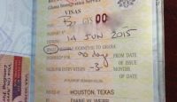 a passport with a stamp and a stamp