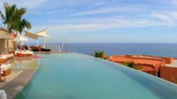 a view of the ocean from a rooftop
