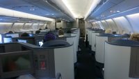 a group of people sitting in an airplane