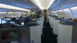 a group of people sitting in an airplane