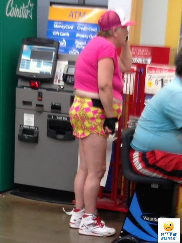 a woman in a pink shirt and yellow shorts