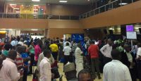 a group of people in a large room