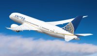 a white airplane in the sky