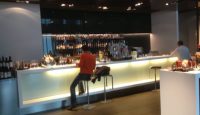 a man sitting at a bar