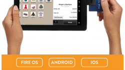 a person holding a tablet with a credit card in the screen