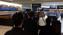 a group of people in a terminal