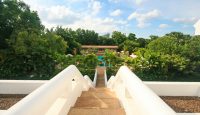 a stairs leading to a pool