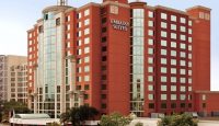 a large red hotel with many windows