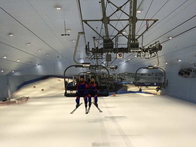 people in a ski lift