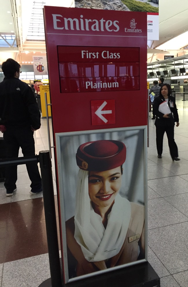 a sign with a picture of a woman in a hat