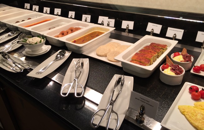 a buffet line of food
