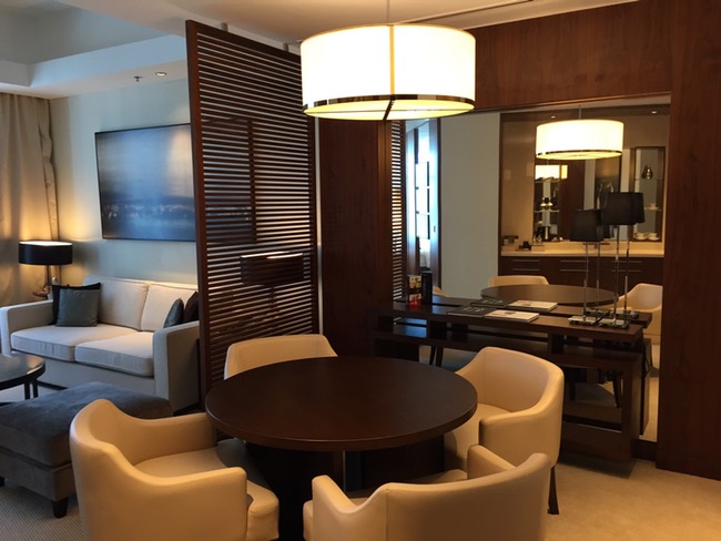 a room with a table and chairs