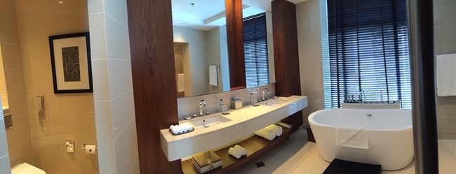 a bathroom with a large mirror