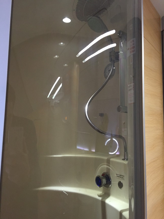 a shower with a glass door