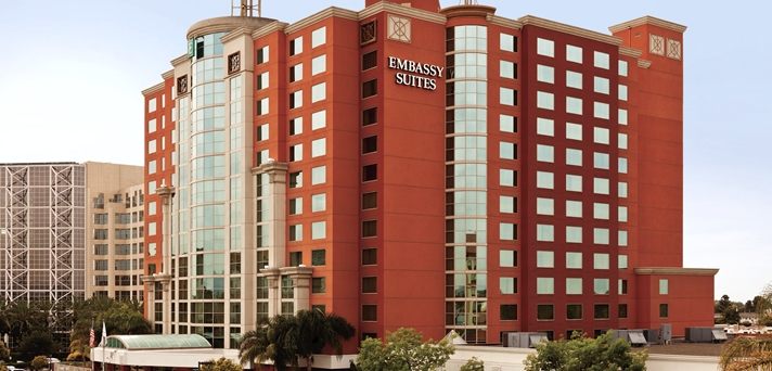 a large red hotel with many windows