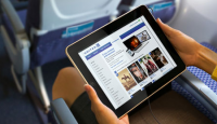 a person holding a tablet
