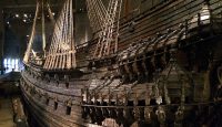a wooden ship in a museum