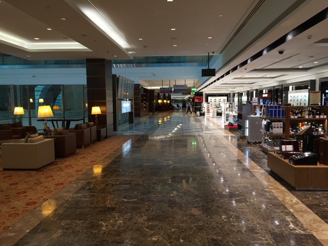 a large hall with a large area of furniture