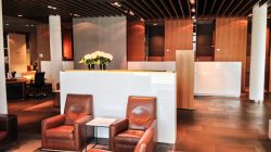 a reception area with chairs and a table