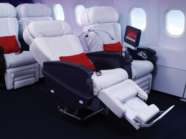 a white leather seats in an airplane