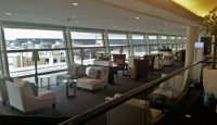 a room with many chairs and tables