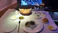 a table with food and glasses on it