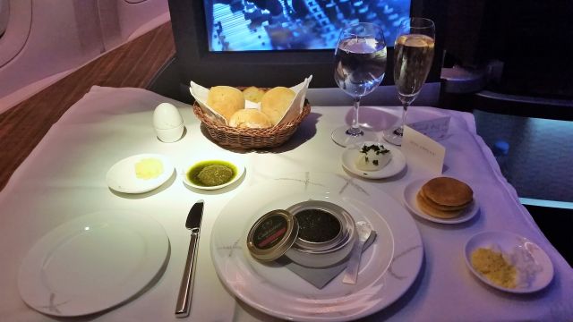 Cathay Pacific First Class champagne and caviar