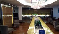 a bar with bottles on it