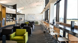 a room with chairs and tables