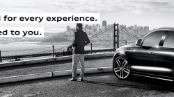 a man standing in front of a car