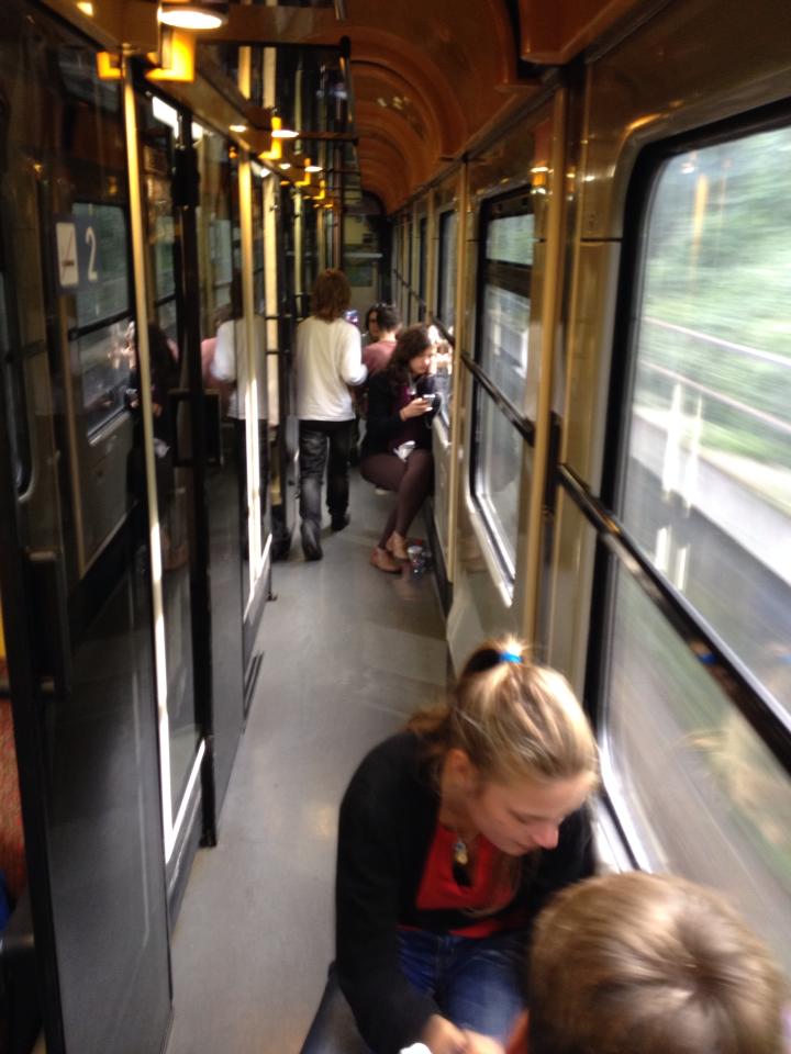 For whatever reason, these people decided to sit on the floor and jump seats, even though there were many empty seats (you just have to read the city pairs that the seats were reserved for)