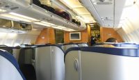 a plane with seats and shelves