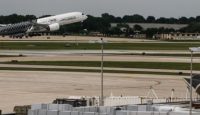 an airplane taking off from a runway