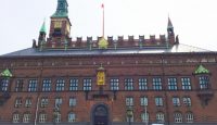a large brick building with a clock tower