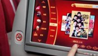 a finger touching a screen