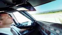 a man in a cockpit