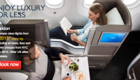 a man and woman sitting in an airplane