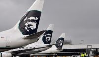 a group of airplanes with a face on the tail fin