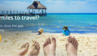 a group of feet on a beach
