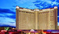 a large hotel with many windows with Monte Carlo Resort and Casino in the background