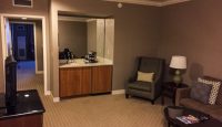 a room with a couch and a chair