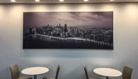 a picture of a city on a wall