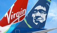 the tail fin of an airplane with a man on it