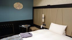 a bed in a hotel room