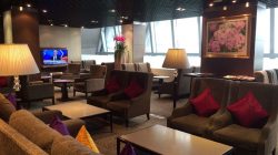 a room with couches and tables