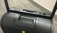 a black suitcase with a handle