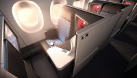 an airplane seat with windows and seats