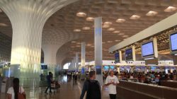 people walking in an airport