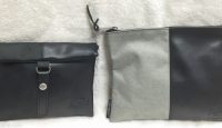 a black and grey purses
